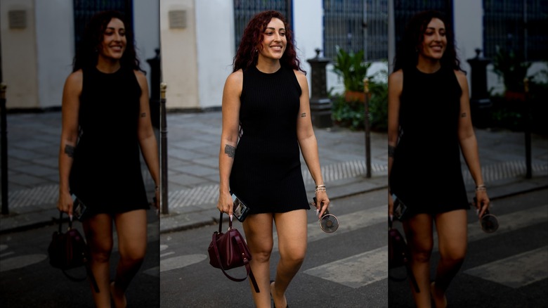 A woman wearing a tank LBD
