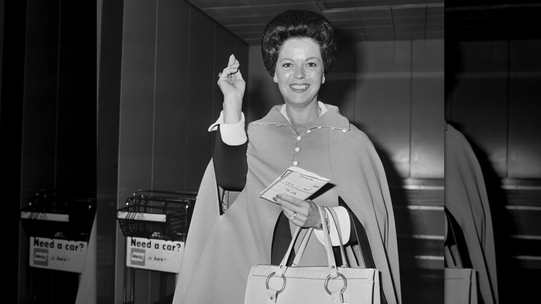 Shirley Temple with short hair and a cape in 1972
