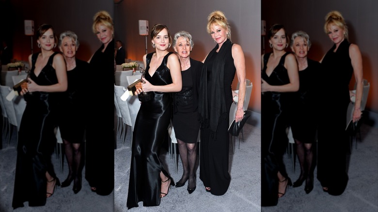 Dakota Johnson, Tippi Hedren and Melanie Griffith pose with the Calvin Klein Emerging Star Award during the 22nd Annual ELLE Women 2015