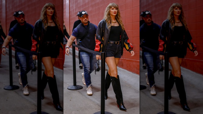 Taylor Swift in high cowboy boots holding a Dior bag