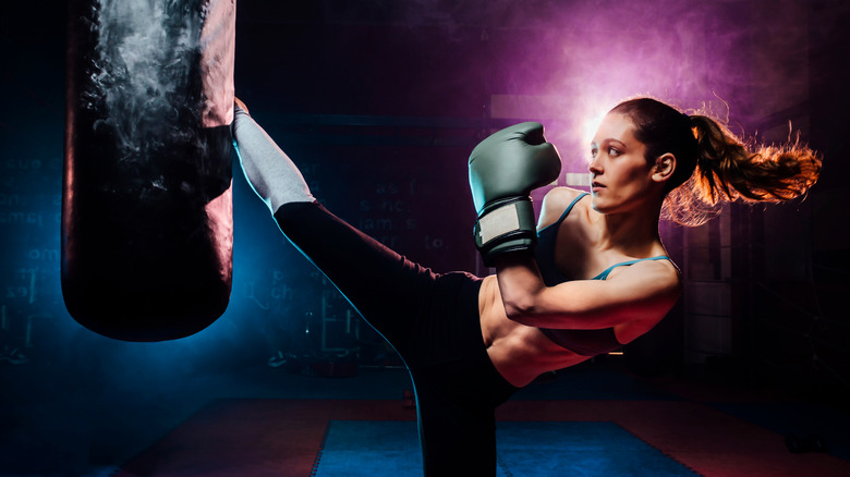 Woman practicing self defense 