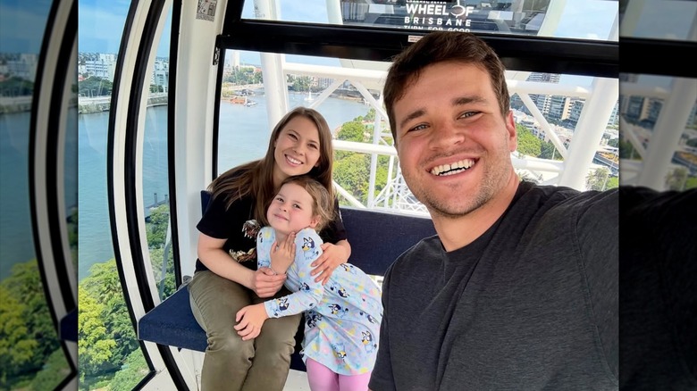 Bindi Irwin and Chandler Powell with Grace on the Brisbane Wheel