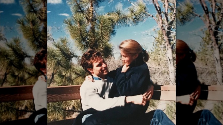 Maureen McCormick sits on Michael Cummings' lap