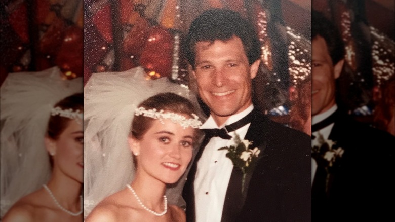 Maureen McCormick and Michael Cummings smile on their wedding day