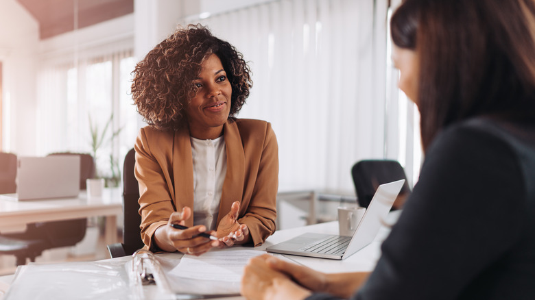 women sitting at business desk