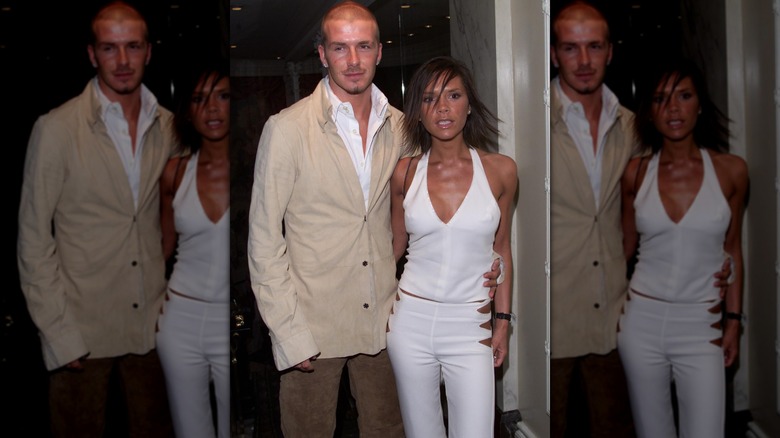Victoria Beckham in a white set with David Beckham
