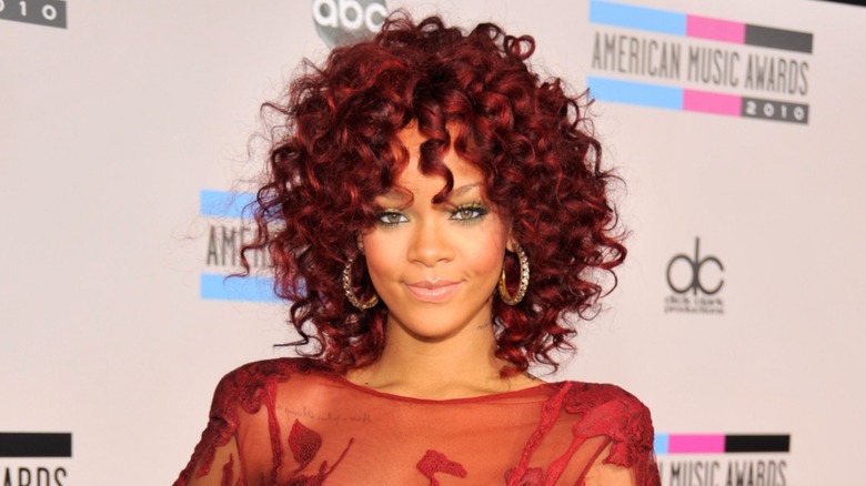 Rihanna with red curly hair at the 2010 AMAs