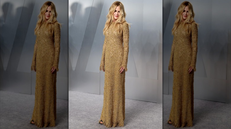 Nicole Kidman wears gold at the Vanity Fair Oscar Party in March 2026
