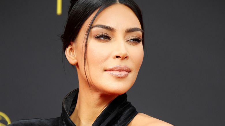 Kim Kardashian wearing fake eyelashes