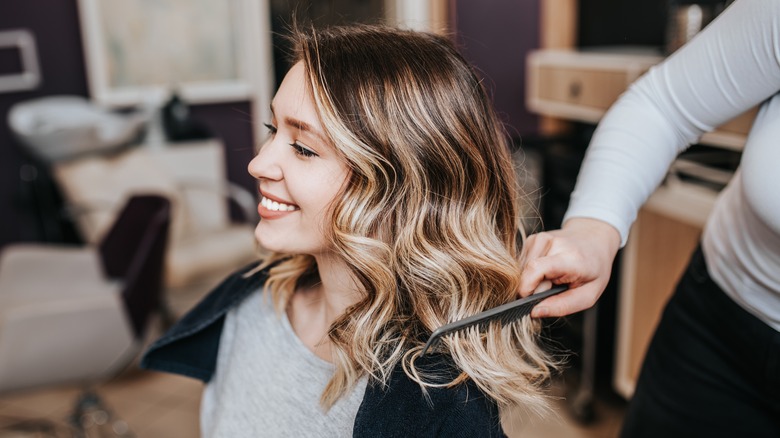 woman getting her hair done