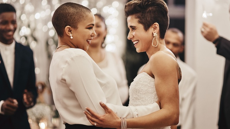 gay couple dancing at wedding 