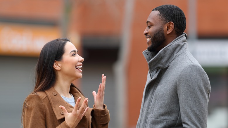 Happy man and woman talking 