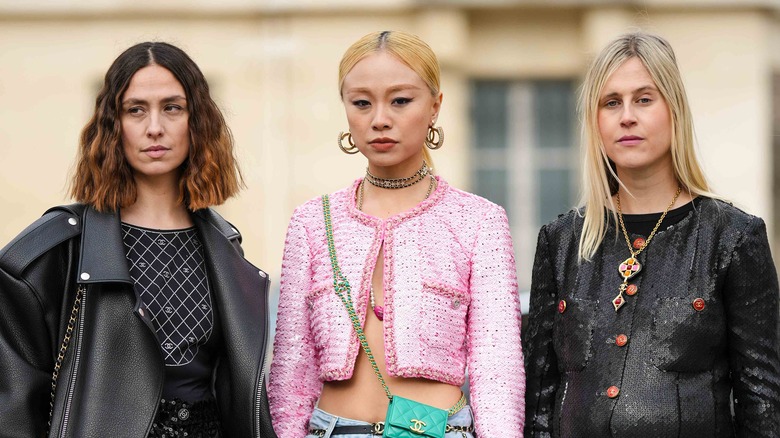 Three people in different hair cut lengths and styles