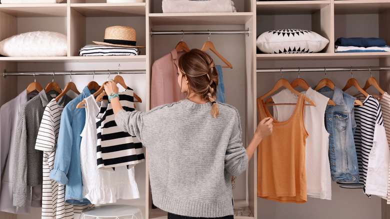 woman organizing her closet