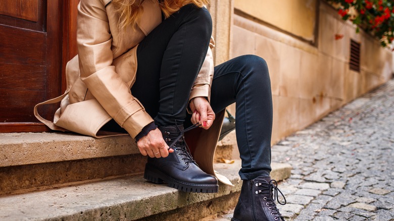 woman in black jeans