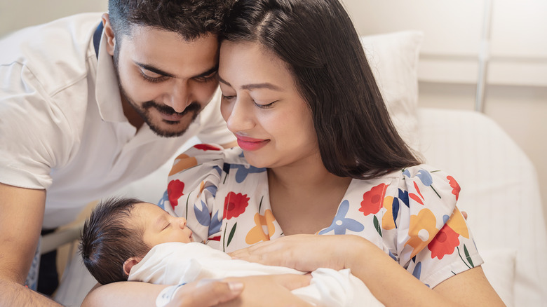 Mother and father with their newborn