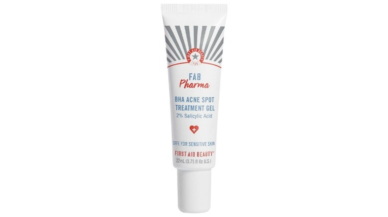 White tube of spot treatment 