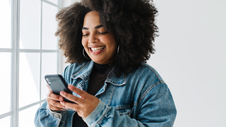 Smiling woman on phone 