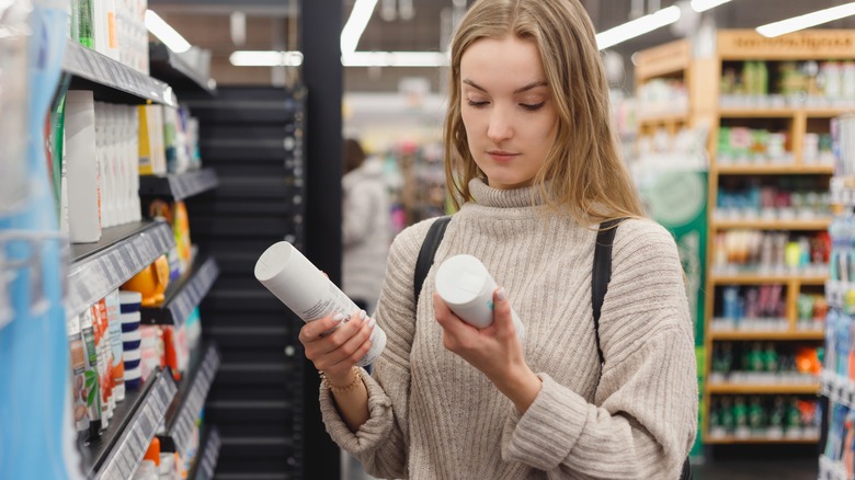 Woman selecting beauty products 