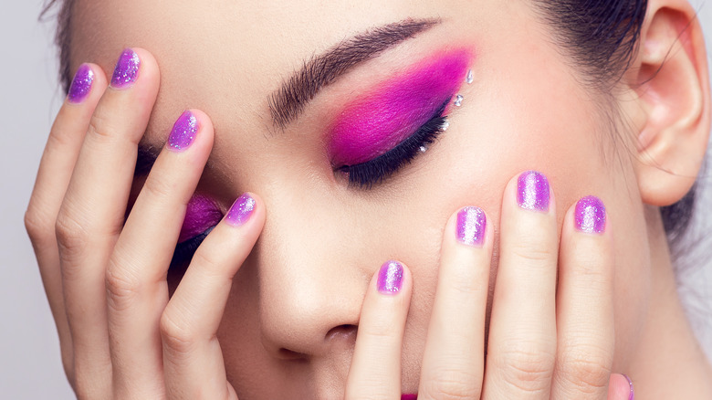 Woman beautiful purple pink eyeshadow
