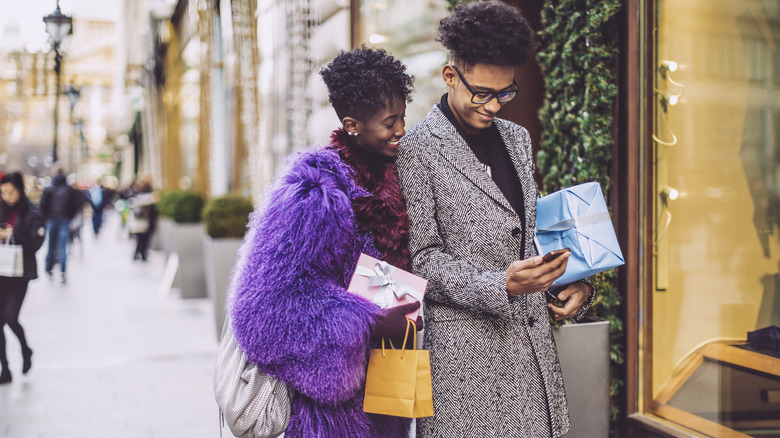 Couple shopping for luxury presents