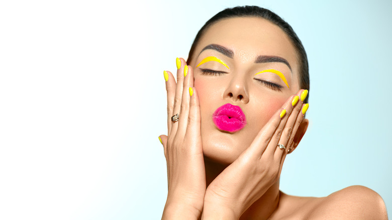 woman in fun, bright makeup 