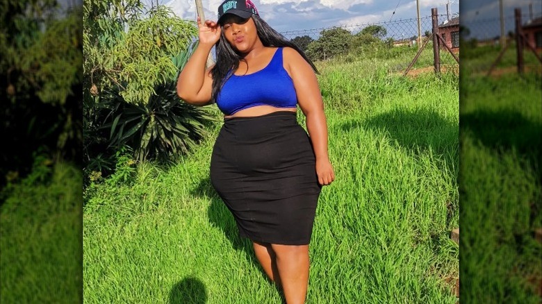 Woman in blue crop top