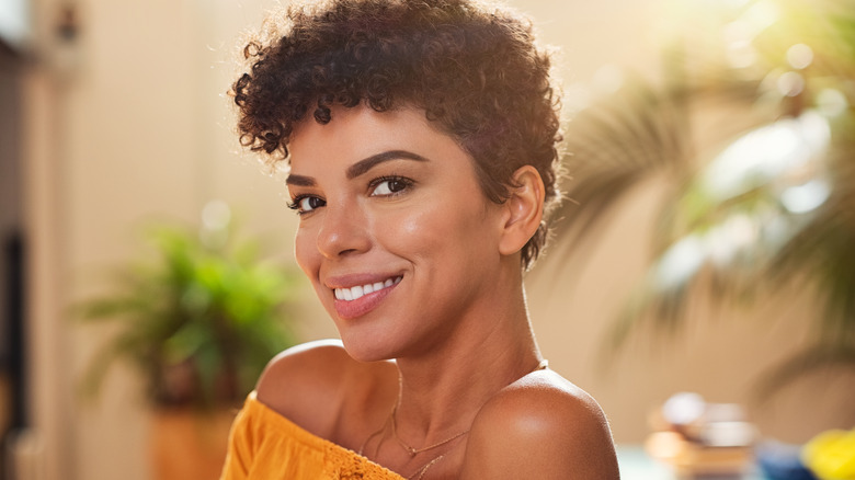 woman with short curly hair