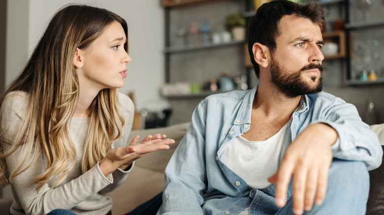 man ignoring woman