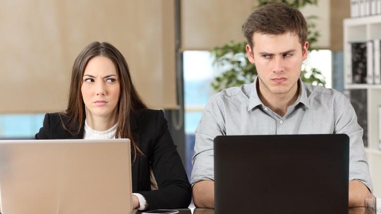 couple fighting at work