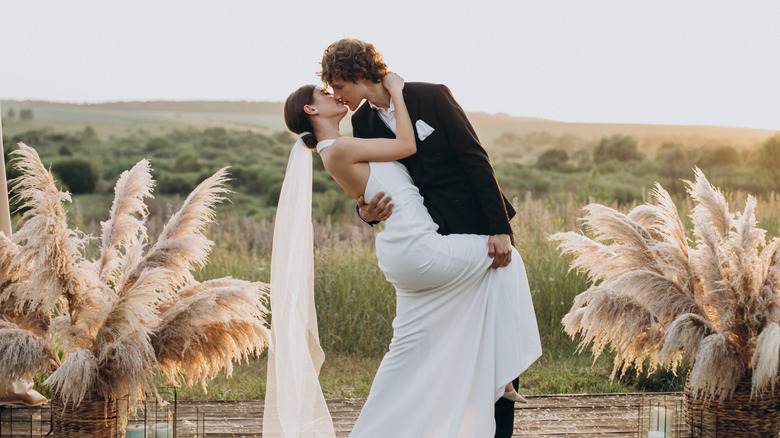 just married couple kissing