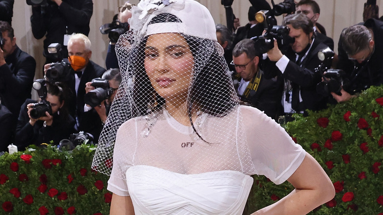 kylie Jenner wearing baseball cap with veil