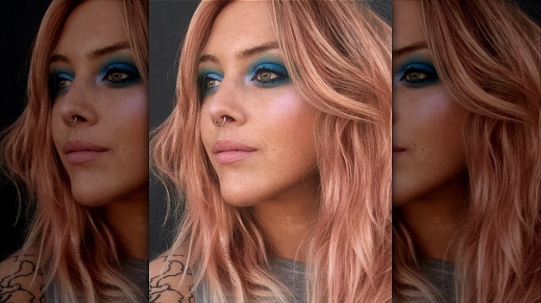 woman with pink peach hair