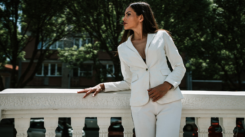 Woman wearing white suit