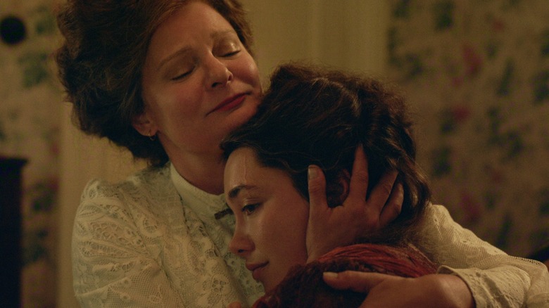Martha Plimpton hugging Florence Pugh in East of Eden