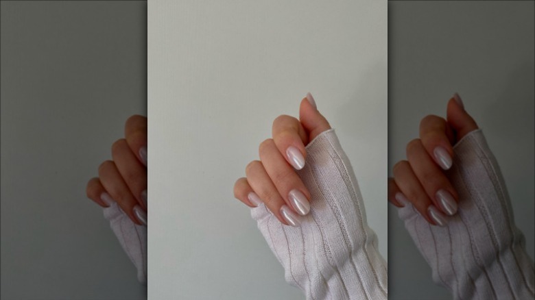 woman with pearl sheen nails