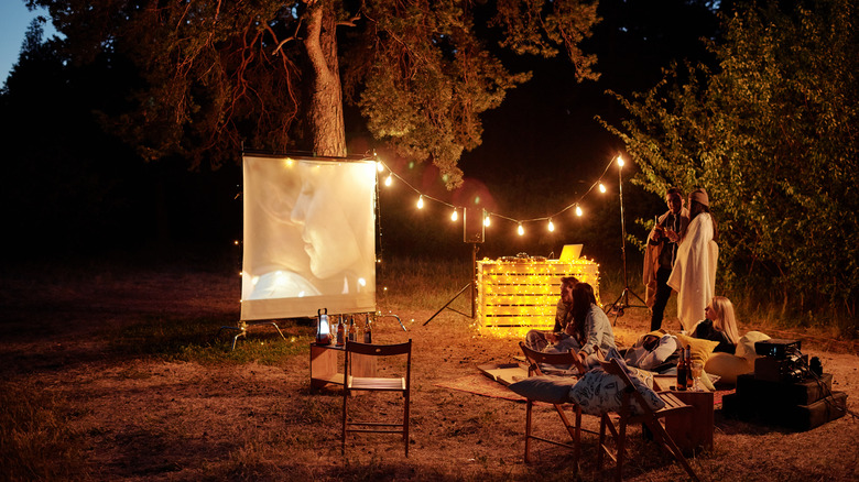 friends enjoying outdoor movie night