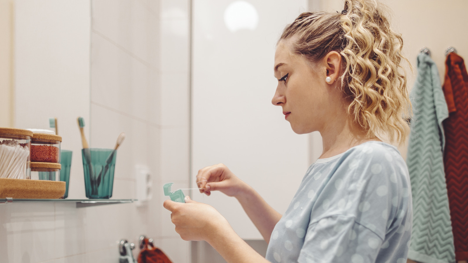 3 Dental Floss Hacks To Add To Your Beauty Routine