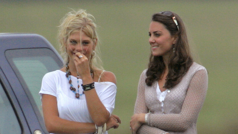 Kate Middleton and Chelsy Davy watching a polo match