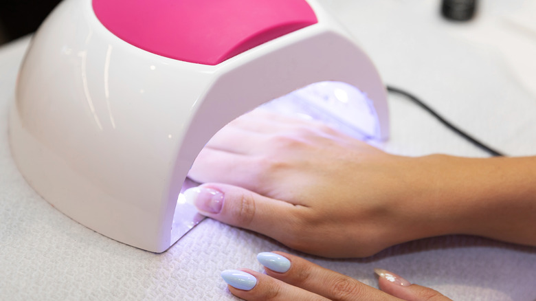 manicure curing in LED lamp 