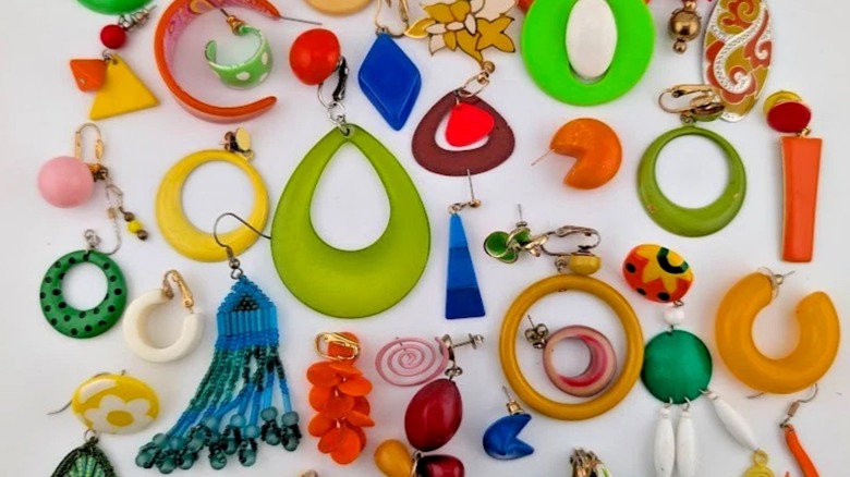 '60s go go jewelry of different shapes and colors inspired by the go-go dancing trend