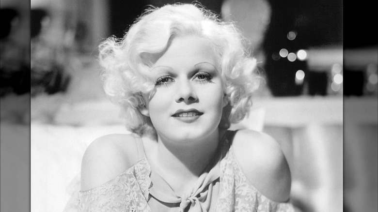 Jean Harlow pictured in black and white with curly platinum hair