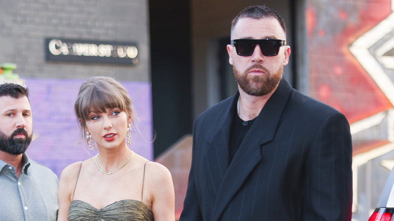 Taylor Swift and Travis Kelce walking together
