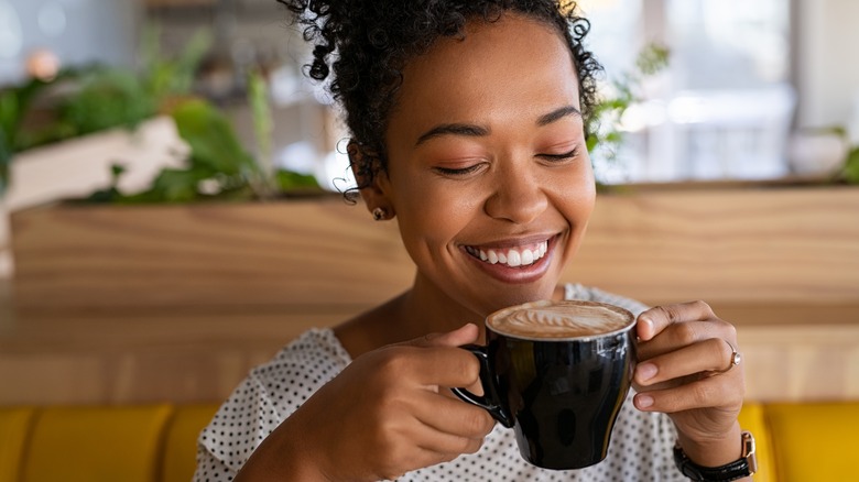 Woman holding a coffee mug