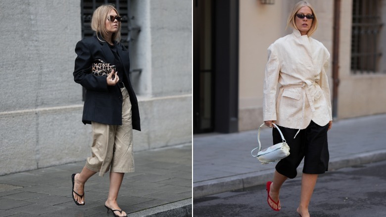 Two women wearing long shorts and jackets