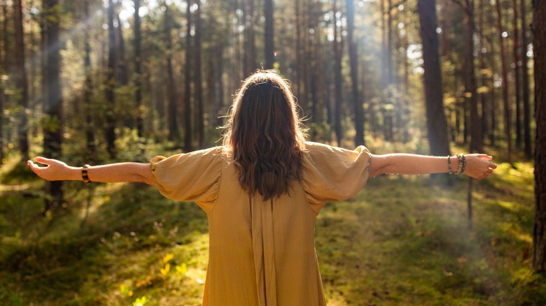 Woman embracing nature 