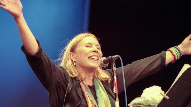 Joni Mitchell singing at a concert in Central Park NYC in 1999