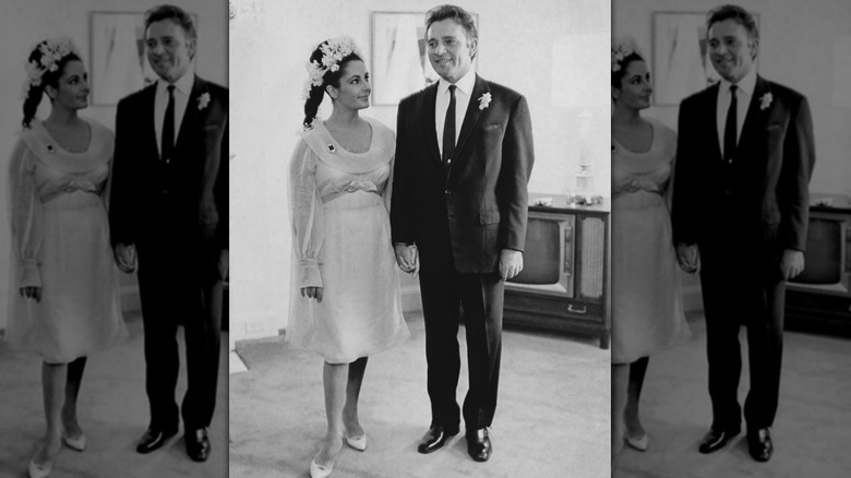Black-and-white photo of Elizabeth Taylor and Richard Burton at their first wedding in 1964.