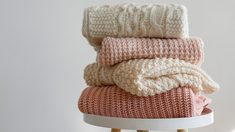 Stack of sweaters.