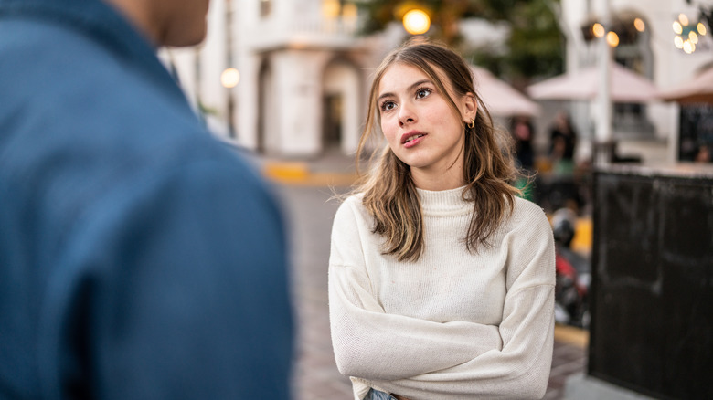 Woman argues with partner on street